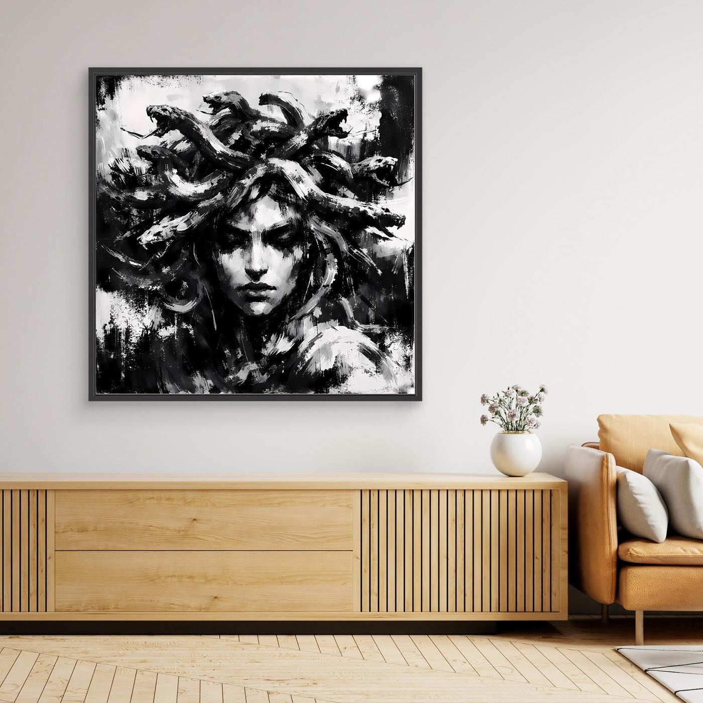 Black-framed black-and-white abstract canvas wall art with Medusa-like face