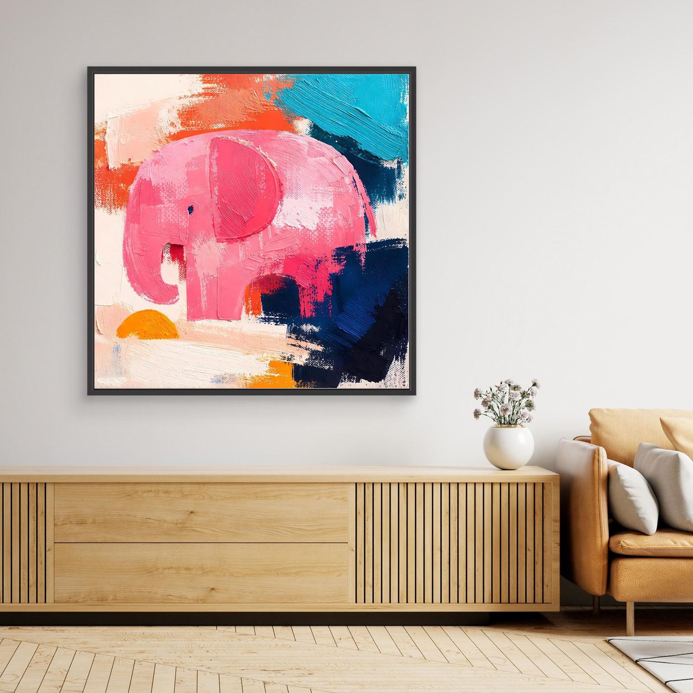 Framed abstract elephant canvas wall art with pink, blue, and orange paint blocks