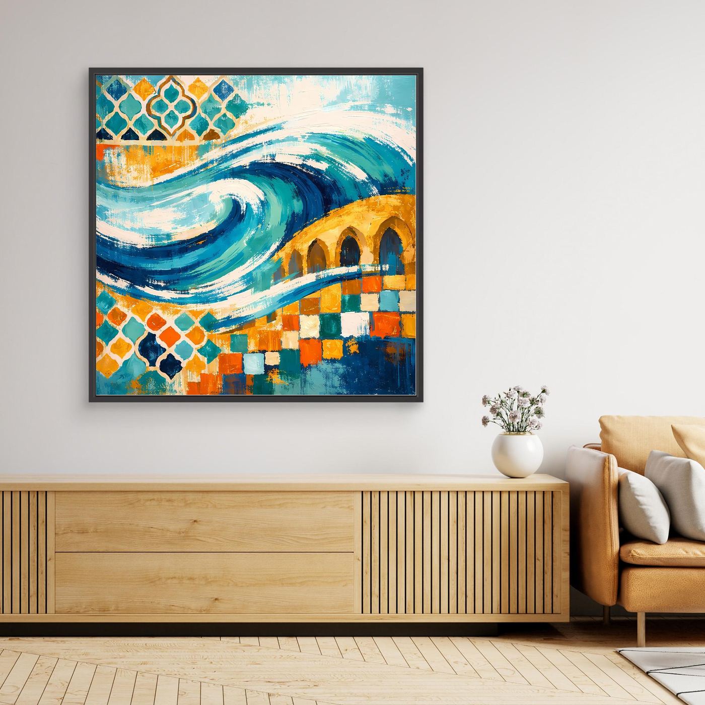 Gerahmtes Leinwandbild mit türkisblauen Wellen und Mosaik-Ornamenten im schwarzen Rahmen