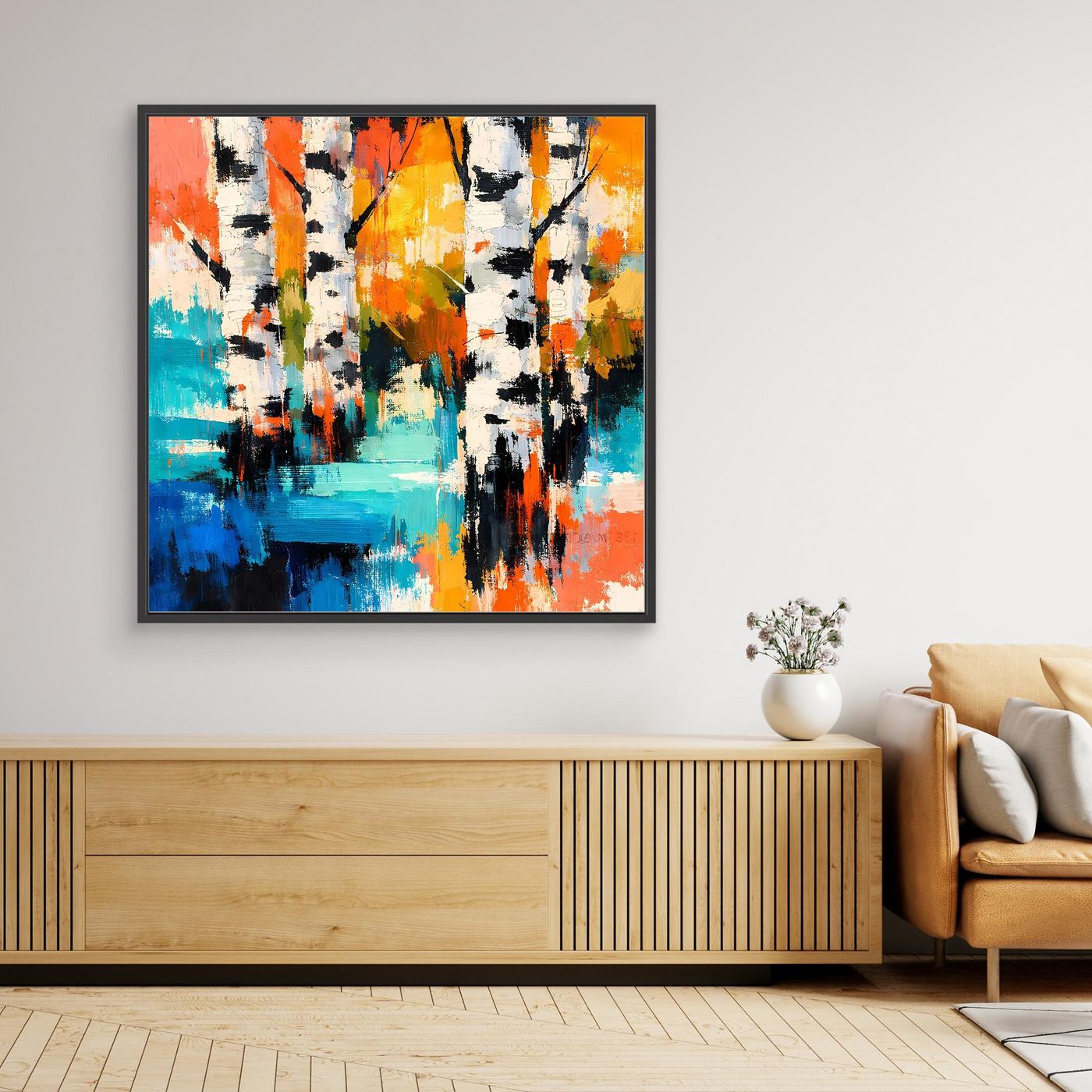 Abstract birch forest canvas wall art with orange, blue, and white splashes, black frame