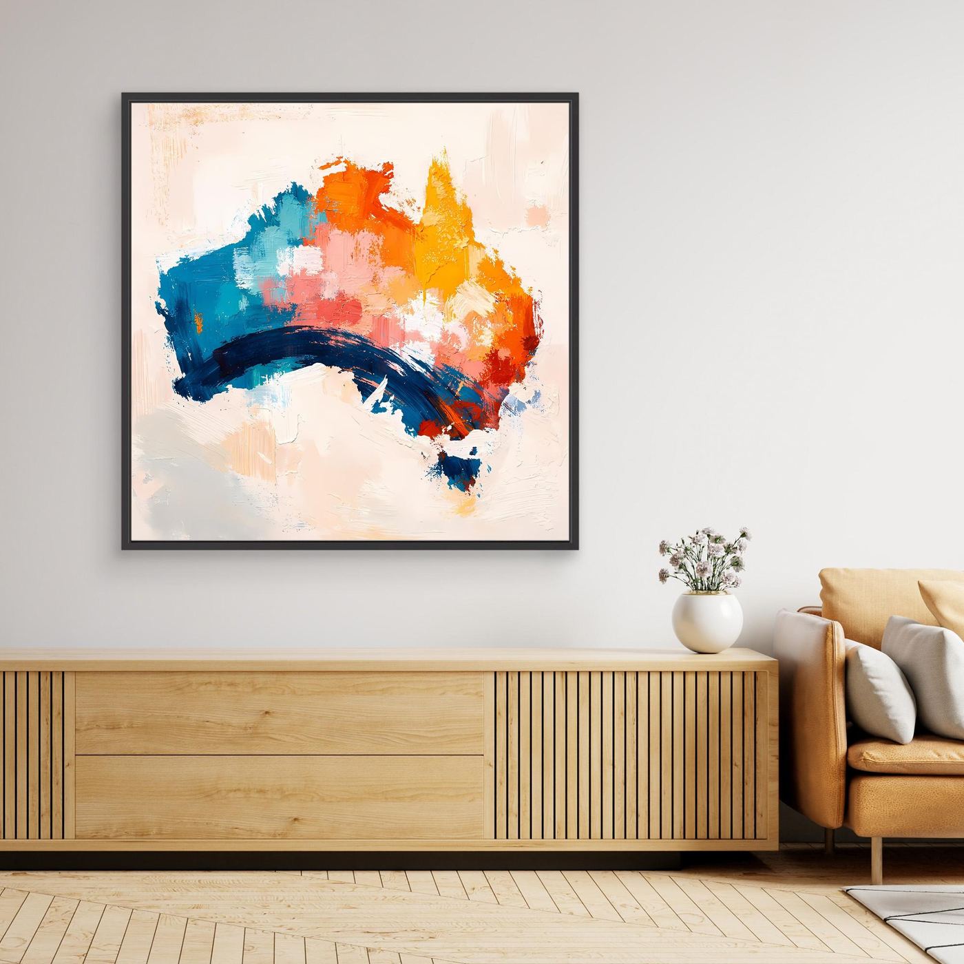 Black-framed canvas wall art with abstract Australia map in blue, orange, yellow, and white.