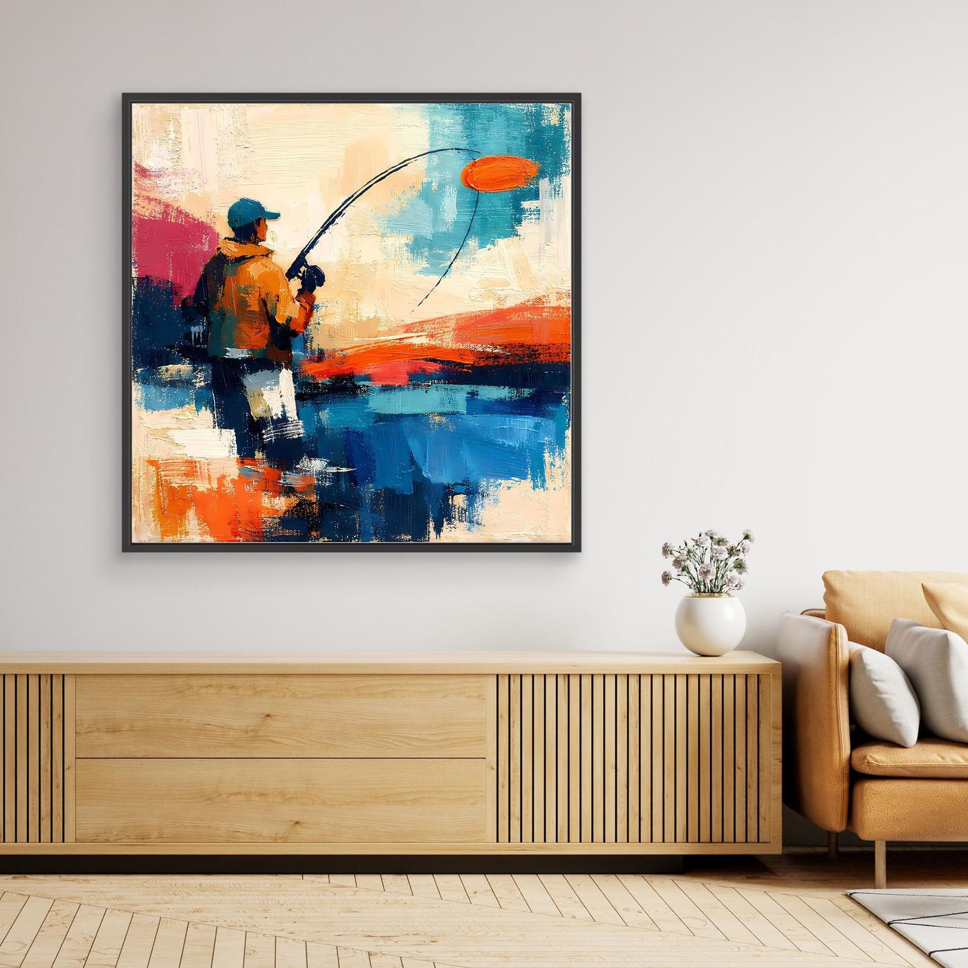 Abstract fishing canvas wall art with orange and blue angler and fish; black frame