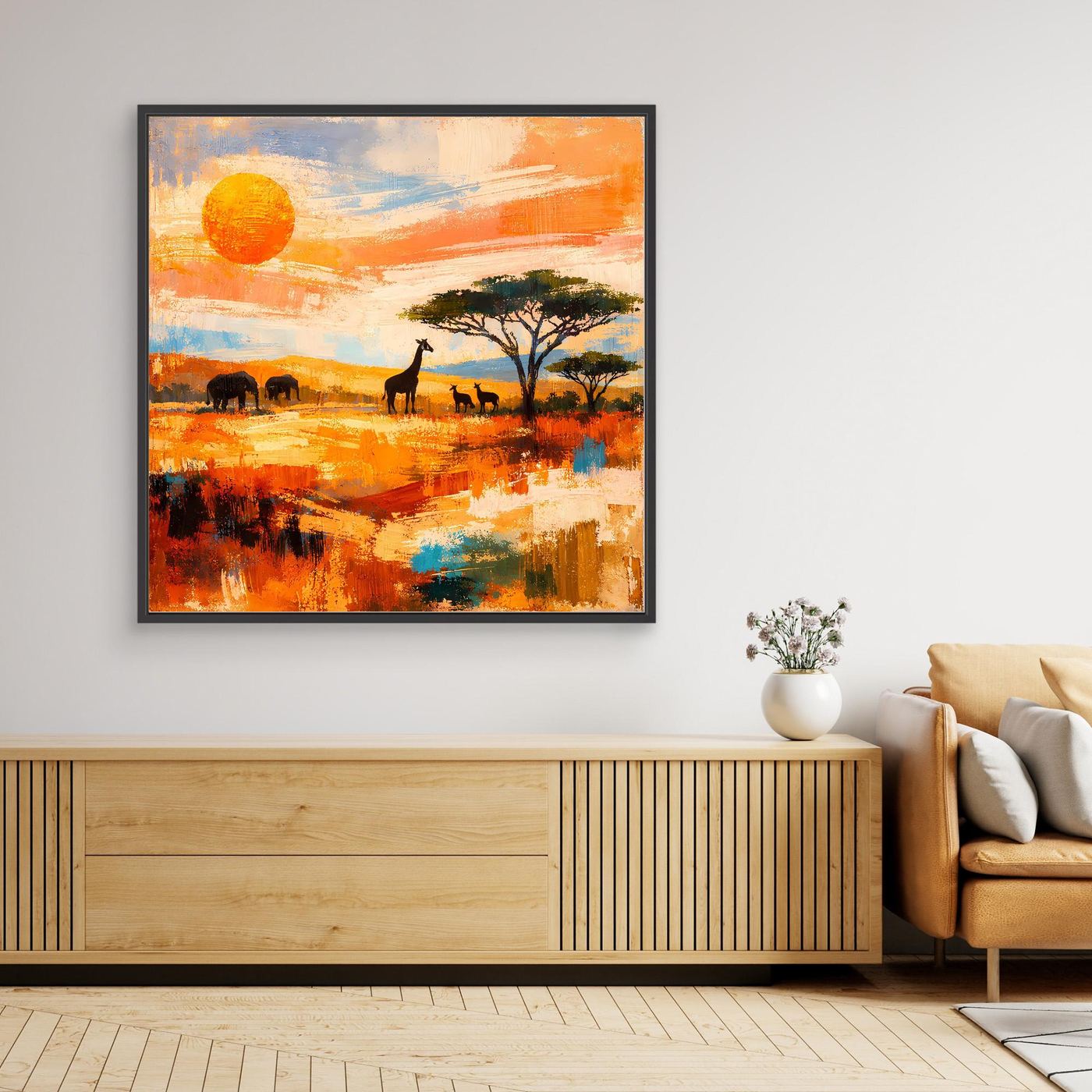 Abstraktes Leinwand-Wandbild mit Savanne und Wildtieren, Sonnenuntergangsfarben, schwarz gerahmt