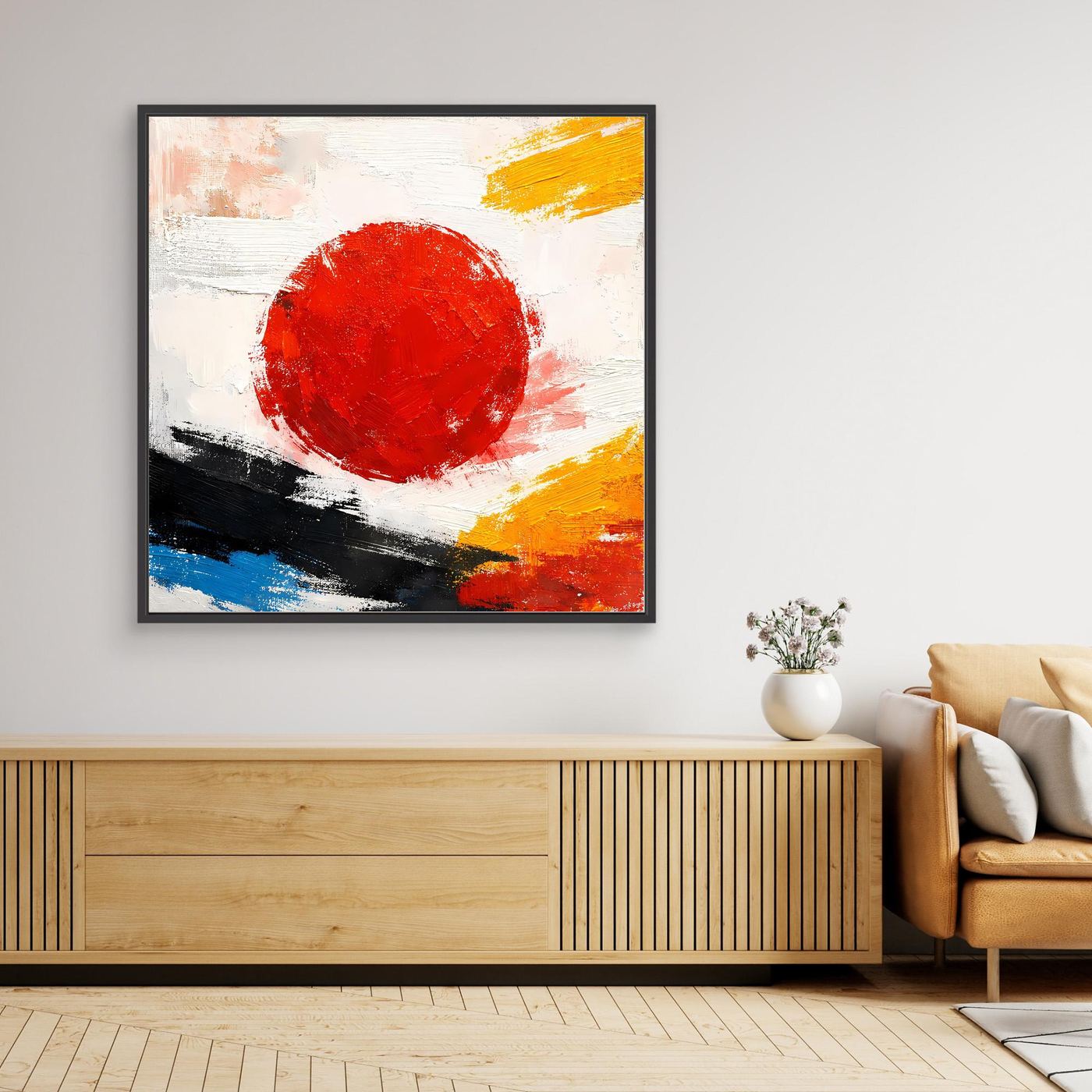 Abstraktes Leinwand-Wandbild mit rotem Kreis, gelben, blauen und schwarzen Farbflächen im Rahmen