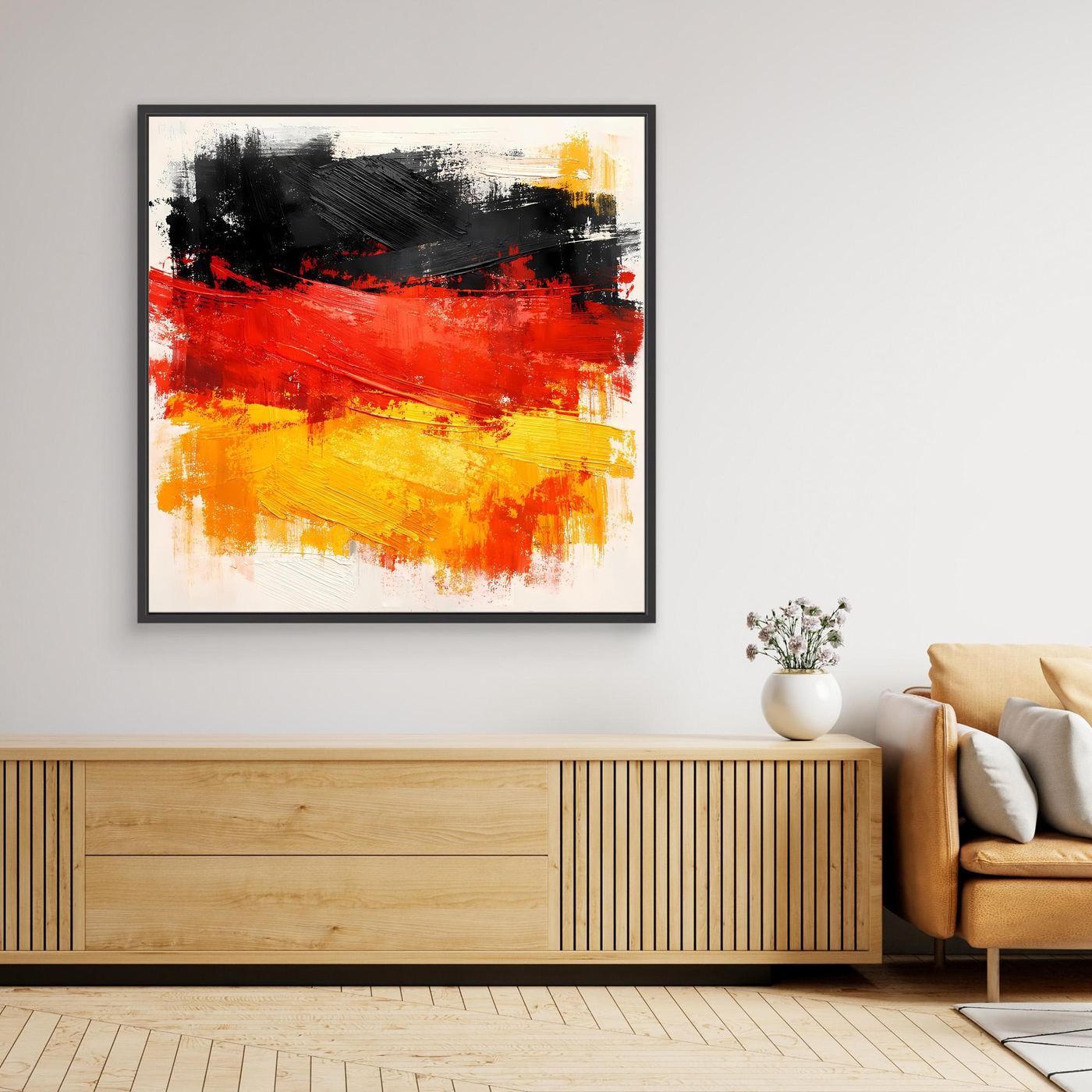 Black framed abstract canvas wall art with black, red, and gold brush strokes