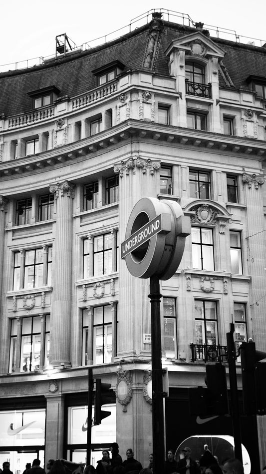 London underground sign in front of ornate building