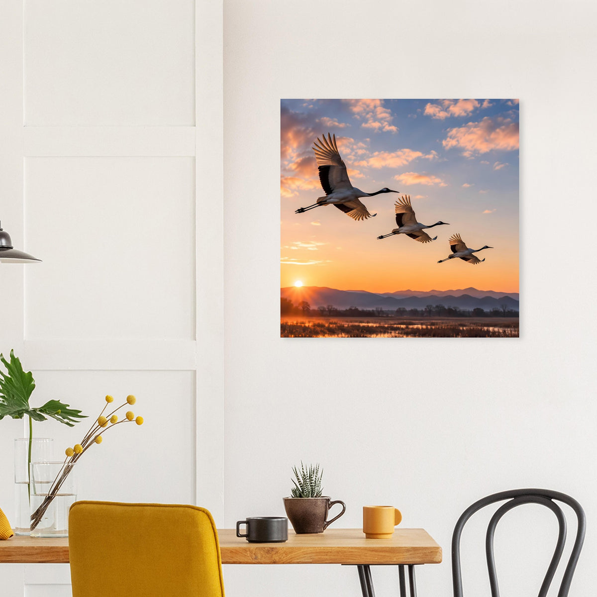 Wandposter mit drei Kranichen im Flug bei Sonnenuntergang am Horizont