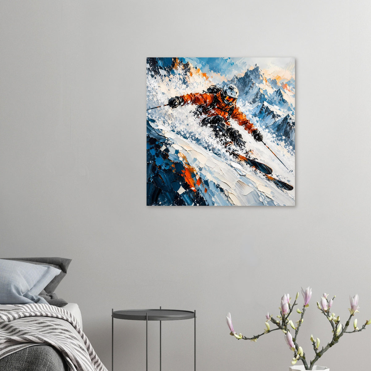 Wintersport-Poster, klein an der Wand: orange Skifahrer auf Ski vor blauem Bergpanorama