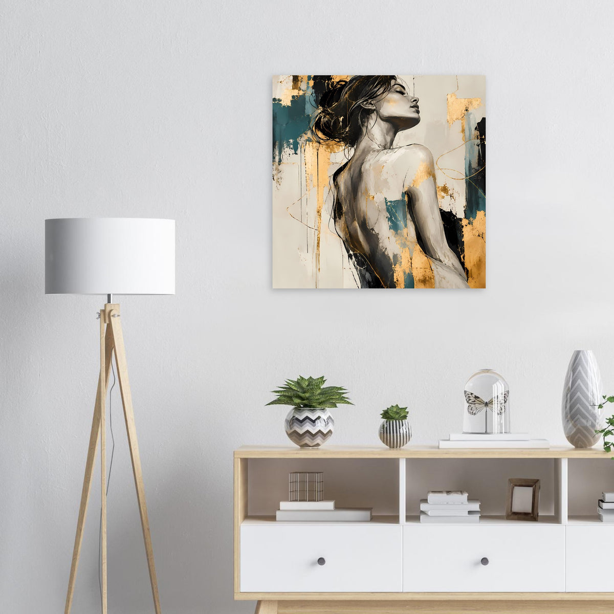 Frauengesicht-Kunstposter im Rahmen mit petrol- und goldfarbenen Spritzern.