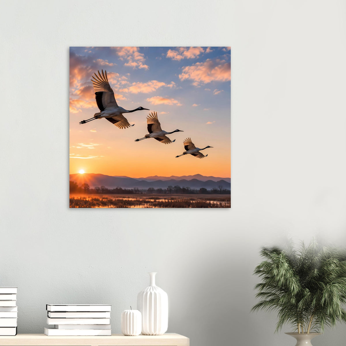 Wandposter mit Kranichen im Flug bei Sonnenuntergang über See