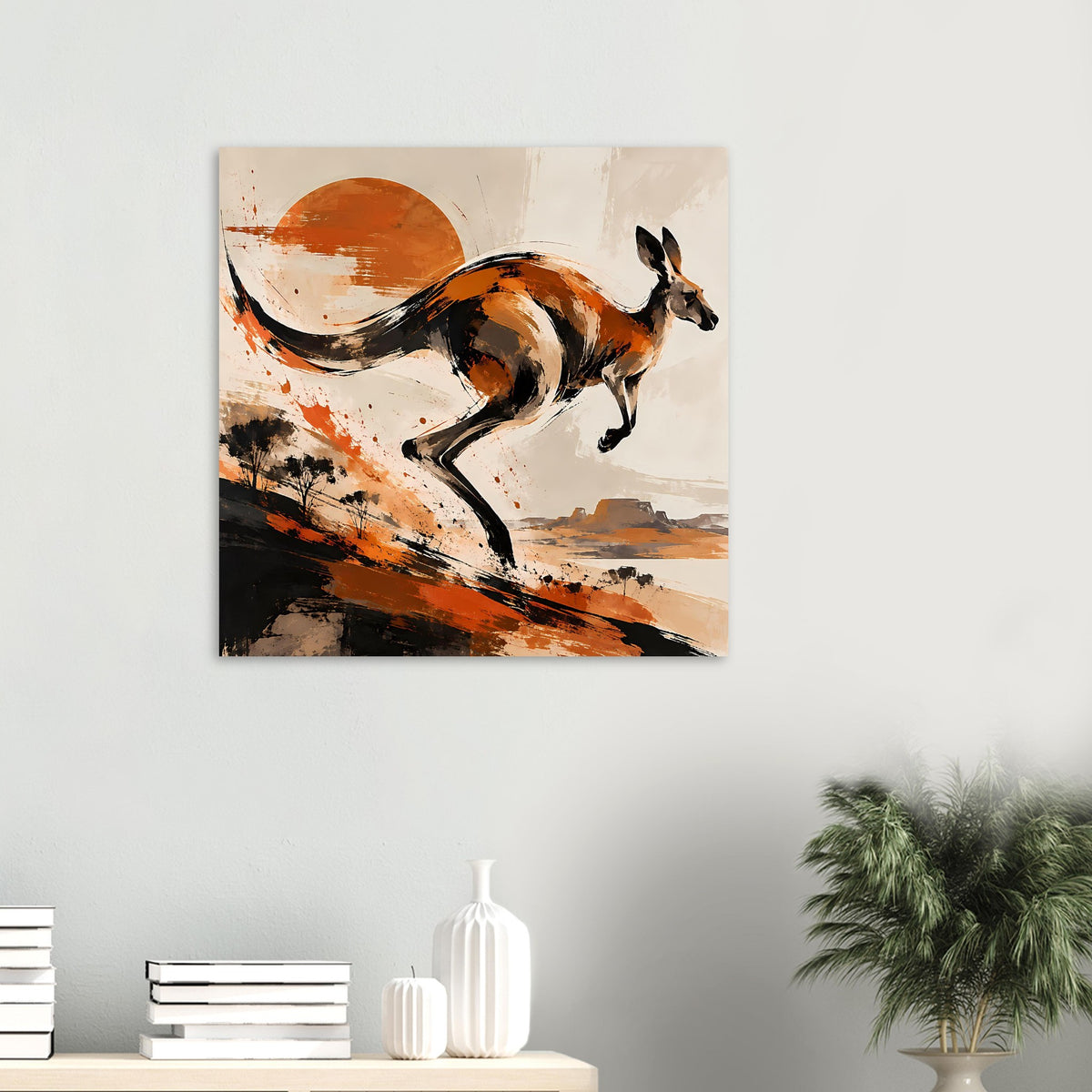 Kleines Poster mit Känguru im Lauf, warme orangebraune Farbtöne und schwarze Konturen.