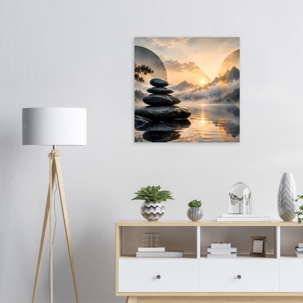 Wandposter mit Steinhaufen und spiegelnder Wasserlandschaft zum Sonnenaufgang