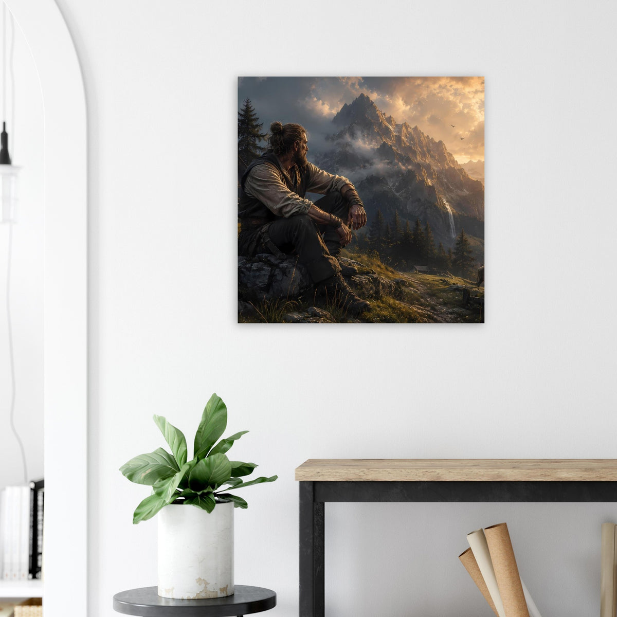 Poster mit sitzendem Mann im Gebirge, in warmen Farbtönen der Bergwelt