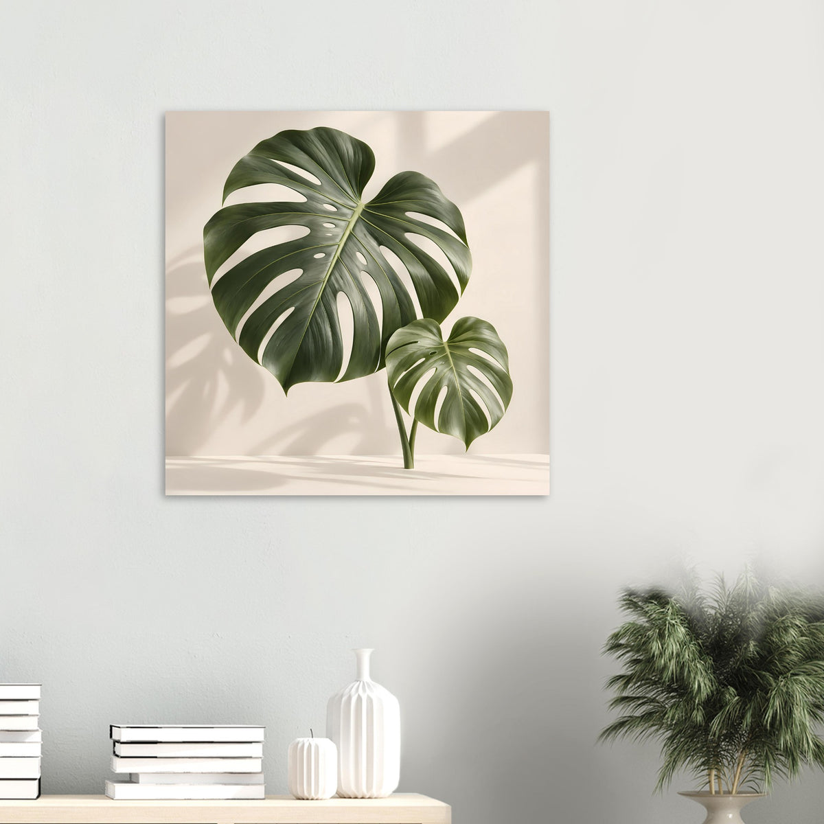 Kleines Monstera-Blattposter im Hochformat: großes grünes Blatt und kleines Blatt