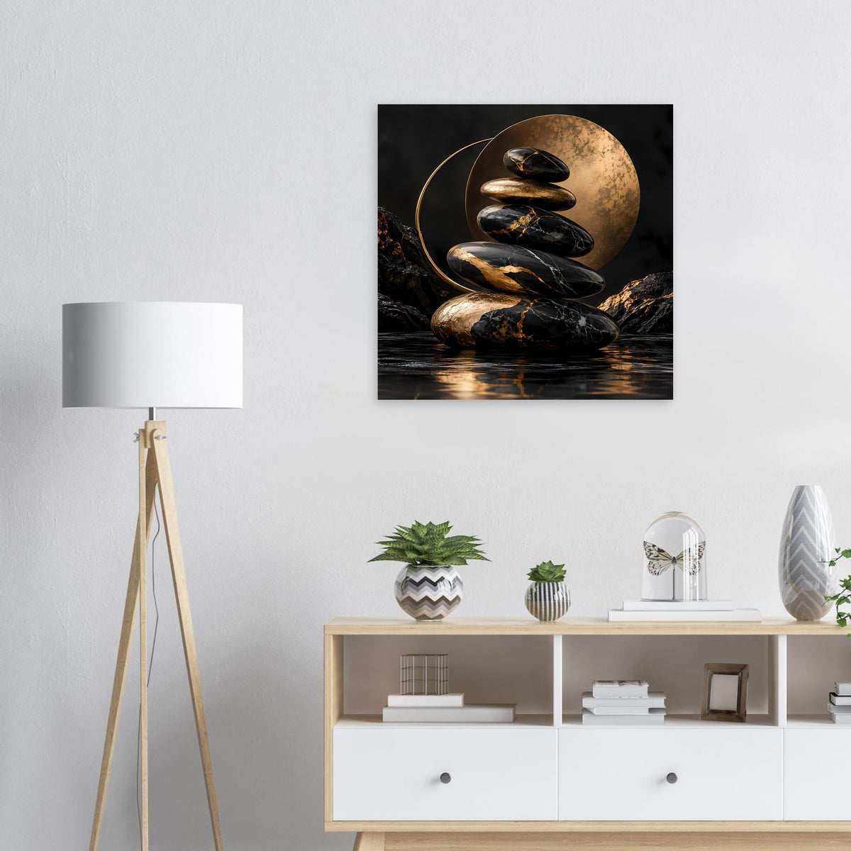 Zen-Stein-Poster mit Stapel dunkler Steine, goldener Mondscheibe und Lichtbogen