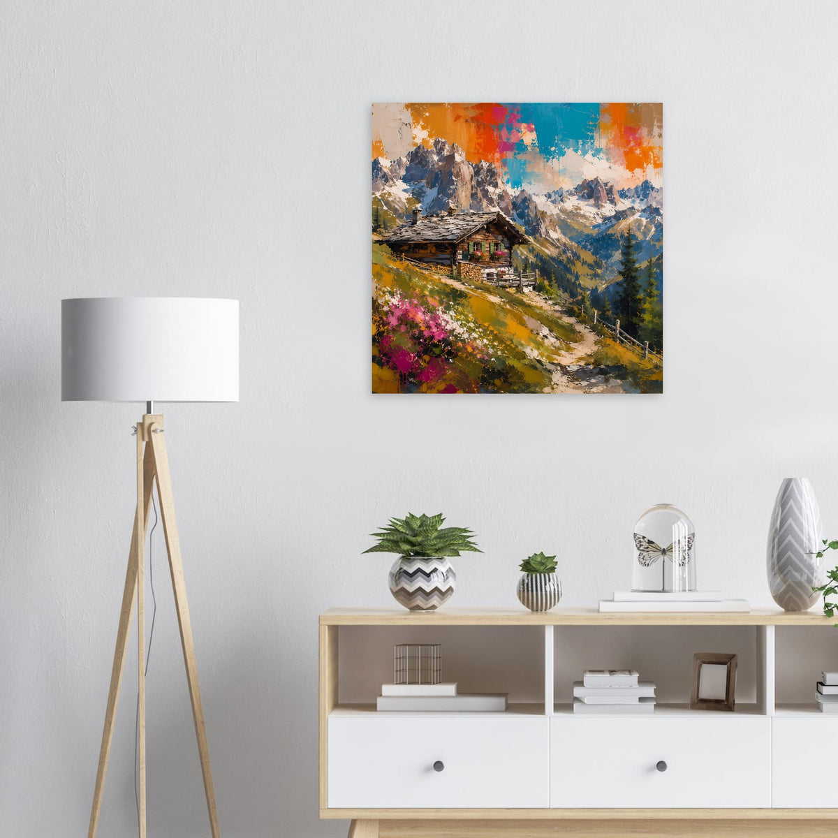 Quadratisches Wandposter: Berglandschaft mit Hütte, gelbem Weg und farbigem Himmel