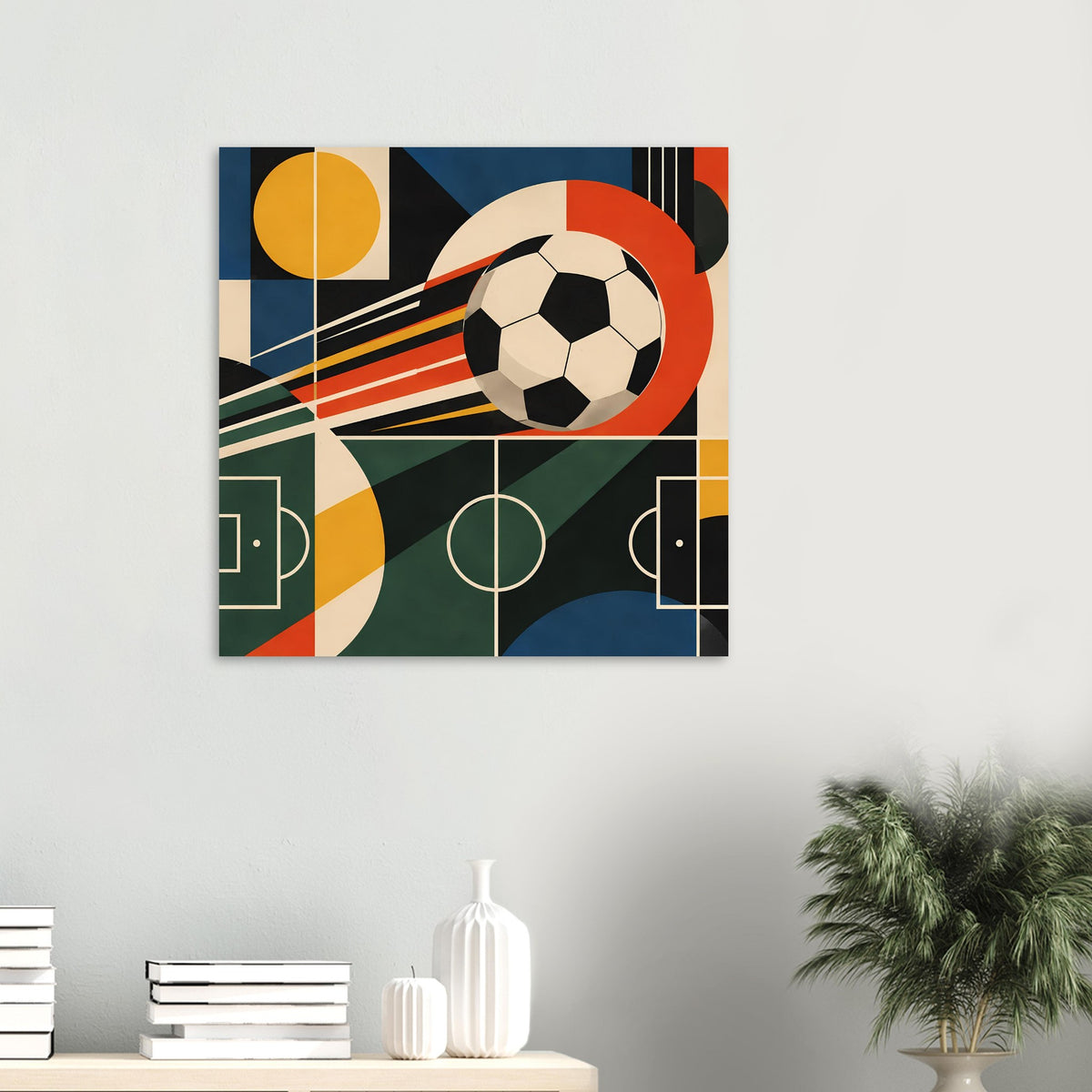 Fußballkunst-Poster im Rahmen mit Fußball, Streifen und Feldlinien in Rot, Blau und Grün.