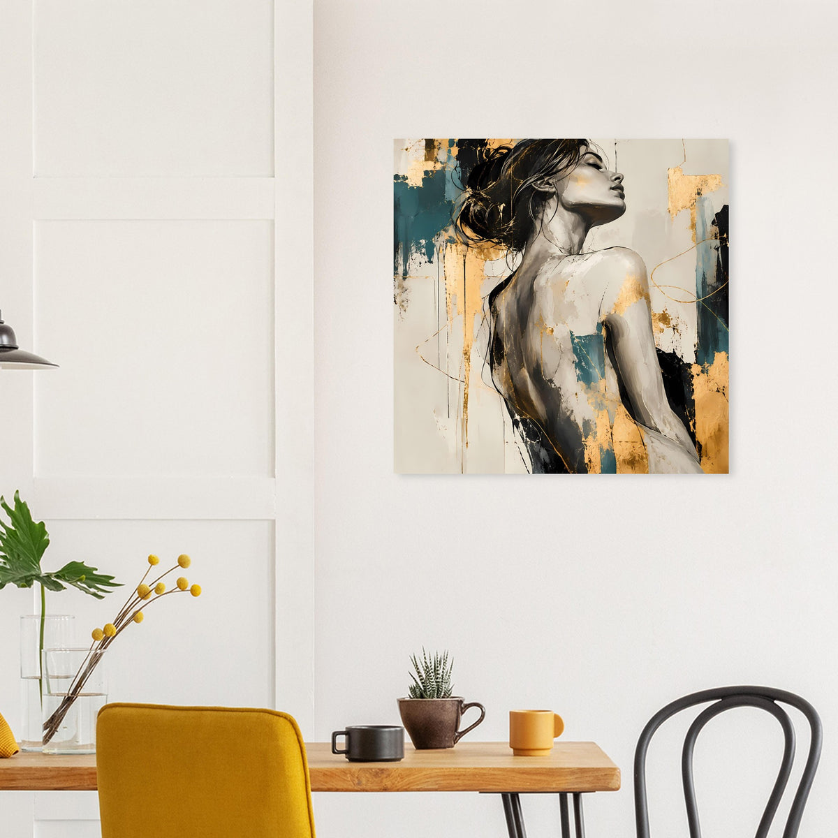 Frauengesicht-Kunstposter im Rahmen mit petrol- und goldfarbenen Sprenkeln vor heller Wand.