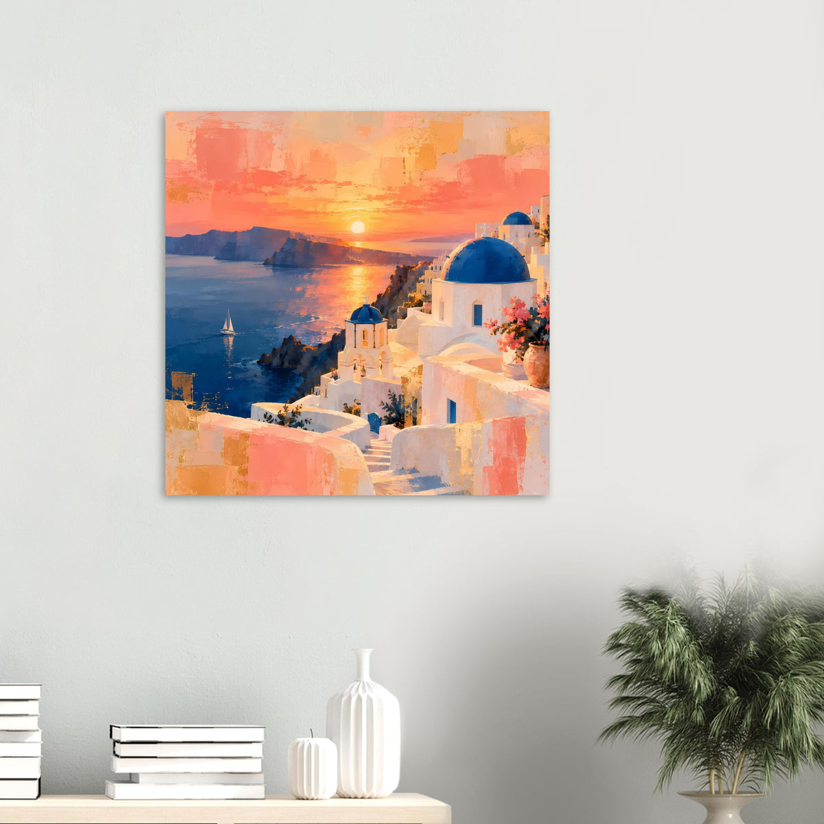 Poster mit Sonnenuntergang und weißem Küstendorf mit blauer Kuppel, auf Wand montiert