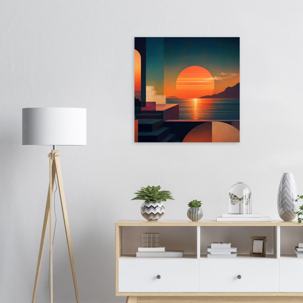 Gerahmter Kunstdruck mit Blick aufs Meer, orangefarbene Sonne und geometrische Bauformen