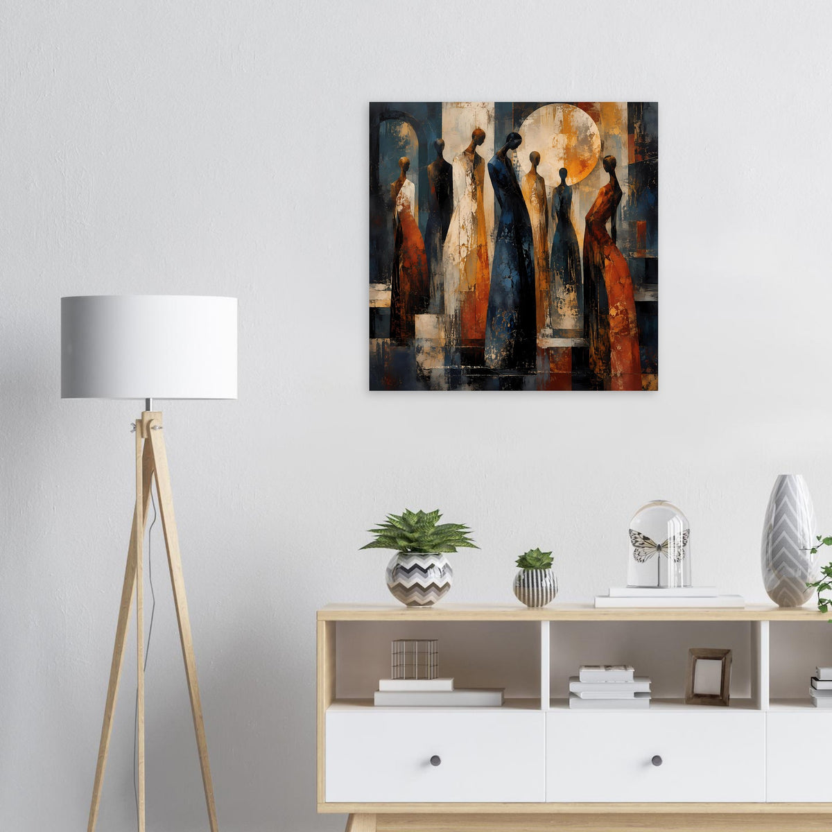 Poster mit abstrakten Figuren in warmen Tönen, quadratisch gerahmt an der Wand