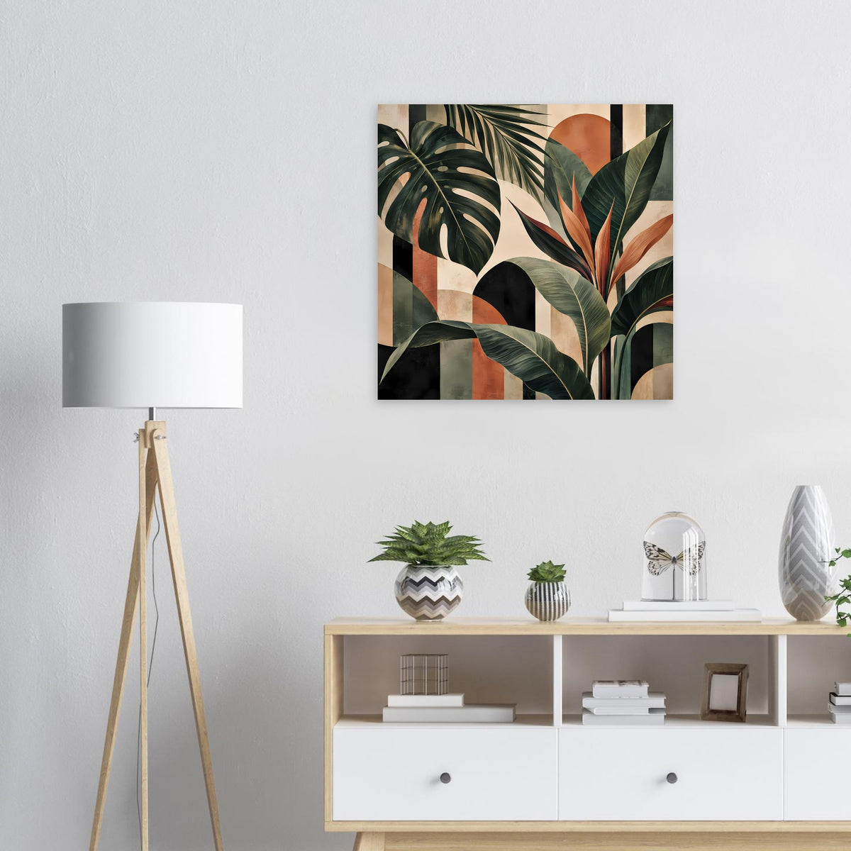 Quadratisches botanisches Kunstposter im schwarzen Rahmen mit tropischen Blättern in warmen Erdtönen