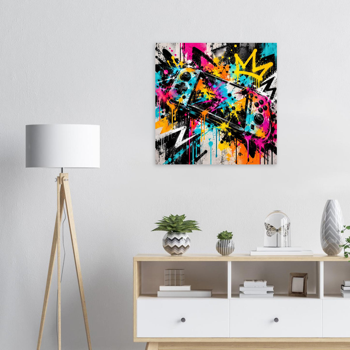 Graffiti-Gaming-Poster auf mattem Papier: bunte Sprühfarbe mit Controller-Motiv.
