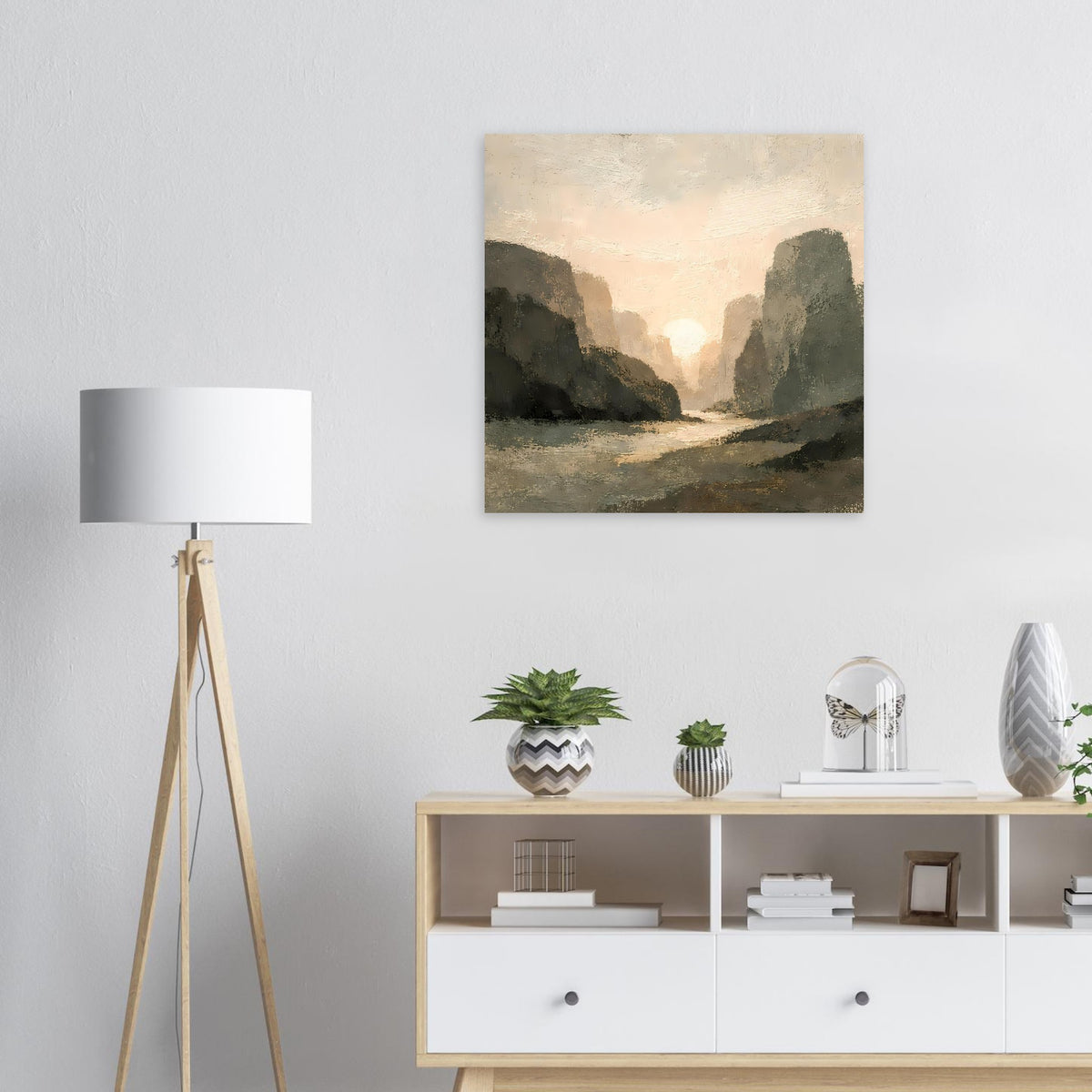 Rechteckiges Wandposter mit Landschaft: Felsen, Tal und warmes Sonnenuntergangslicht.