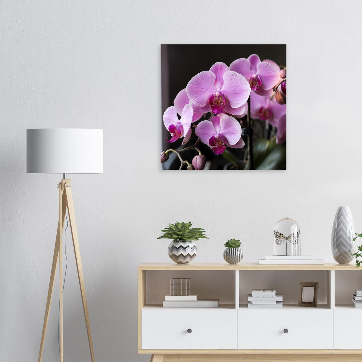 Poster mit pastellrosa Orchideenblüten im schwarzen rechteckigen Rahmen