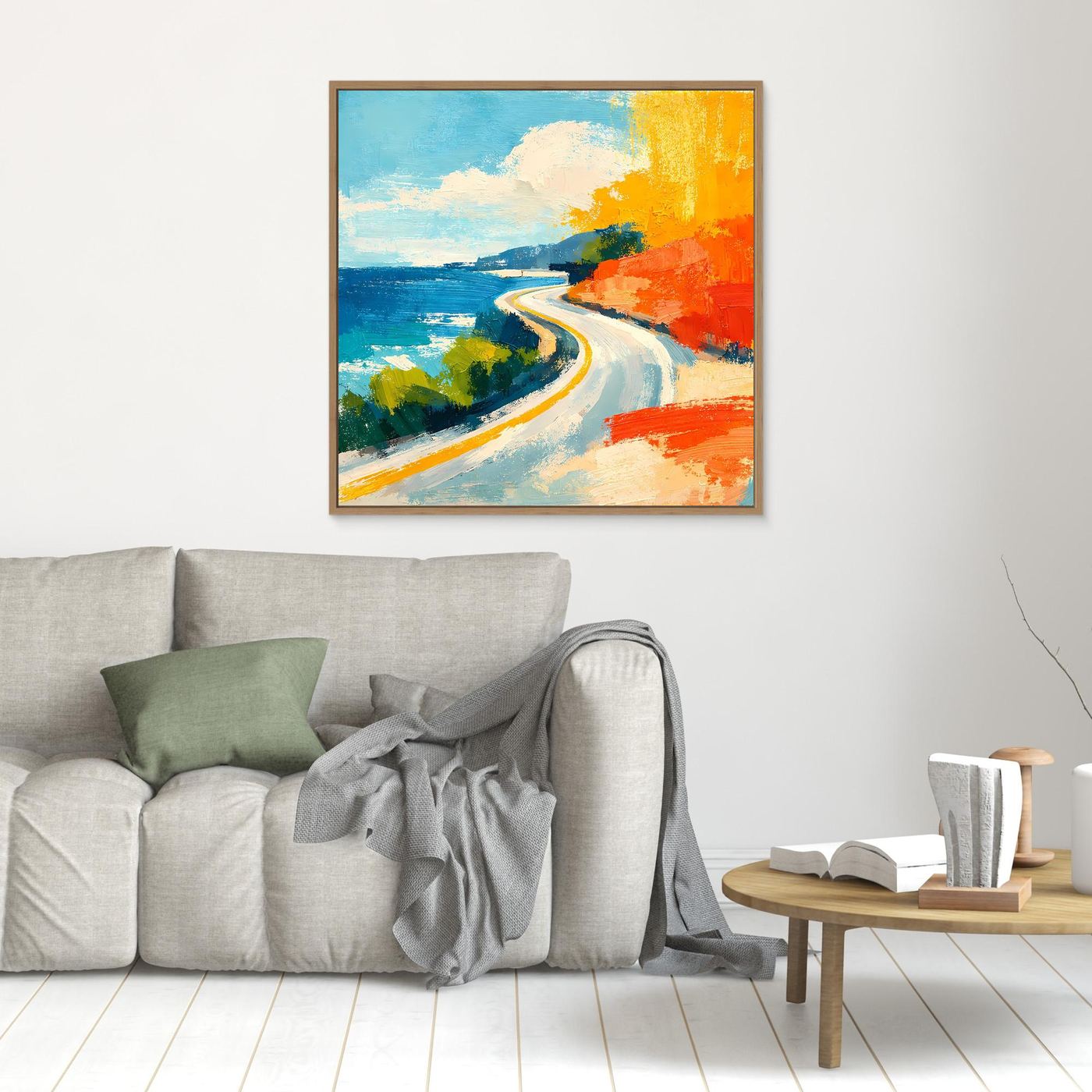 Small coastal abstract wall art with light wood frame, blue water, winding road, orange shore