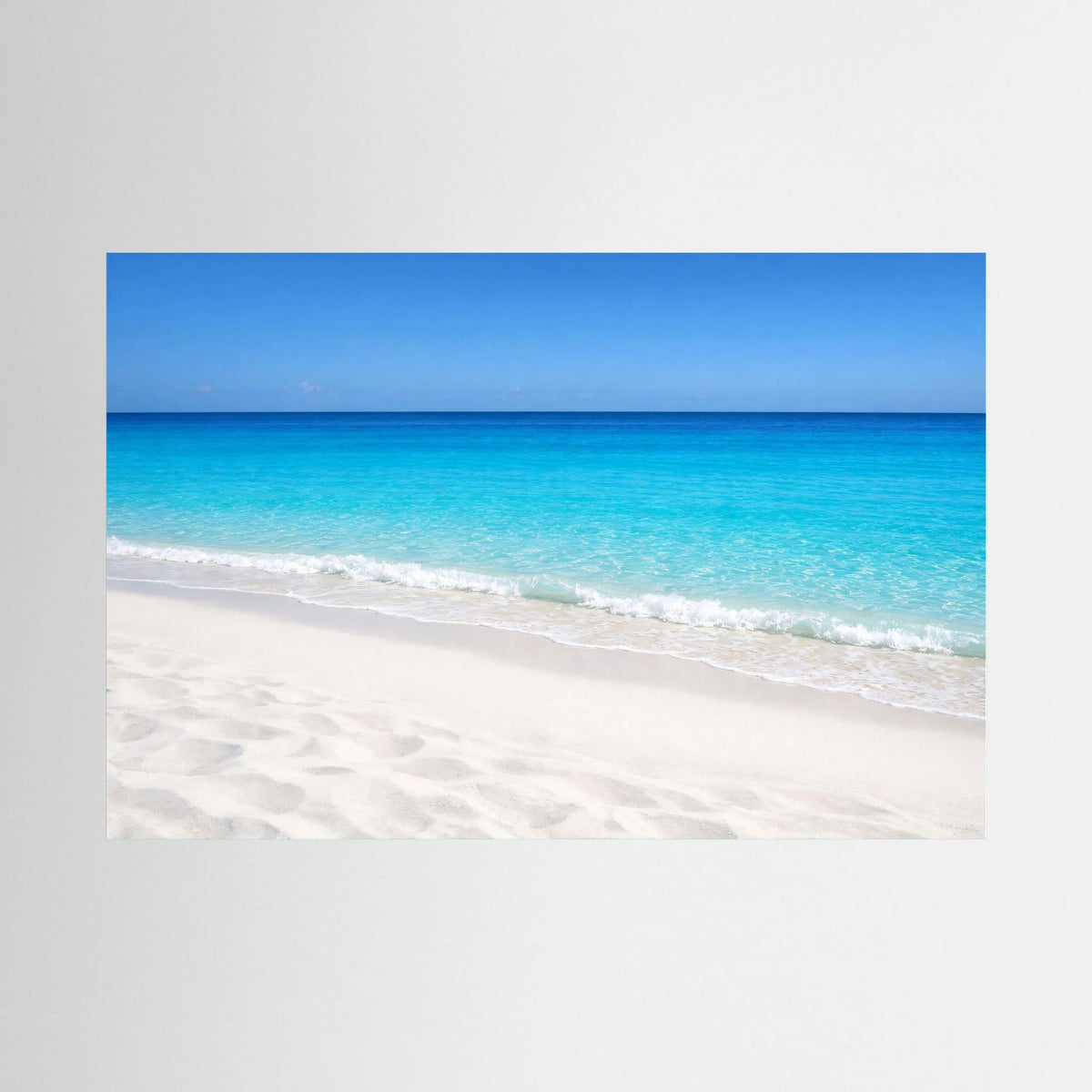 Wandbild mit türkisblauem Meer, hellem Sandstrand und blauem Rand, Querformat