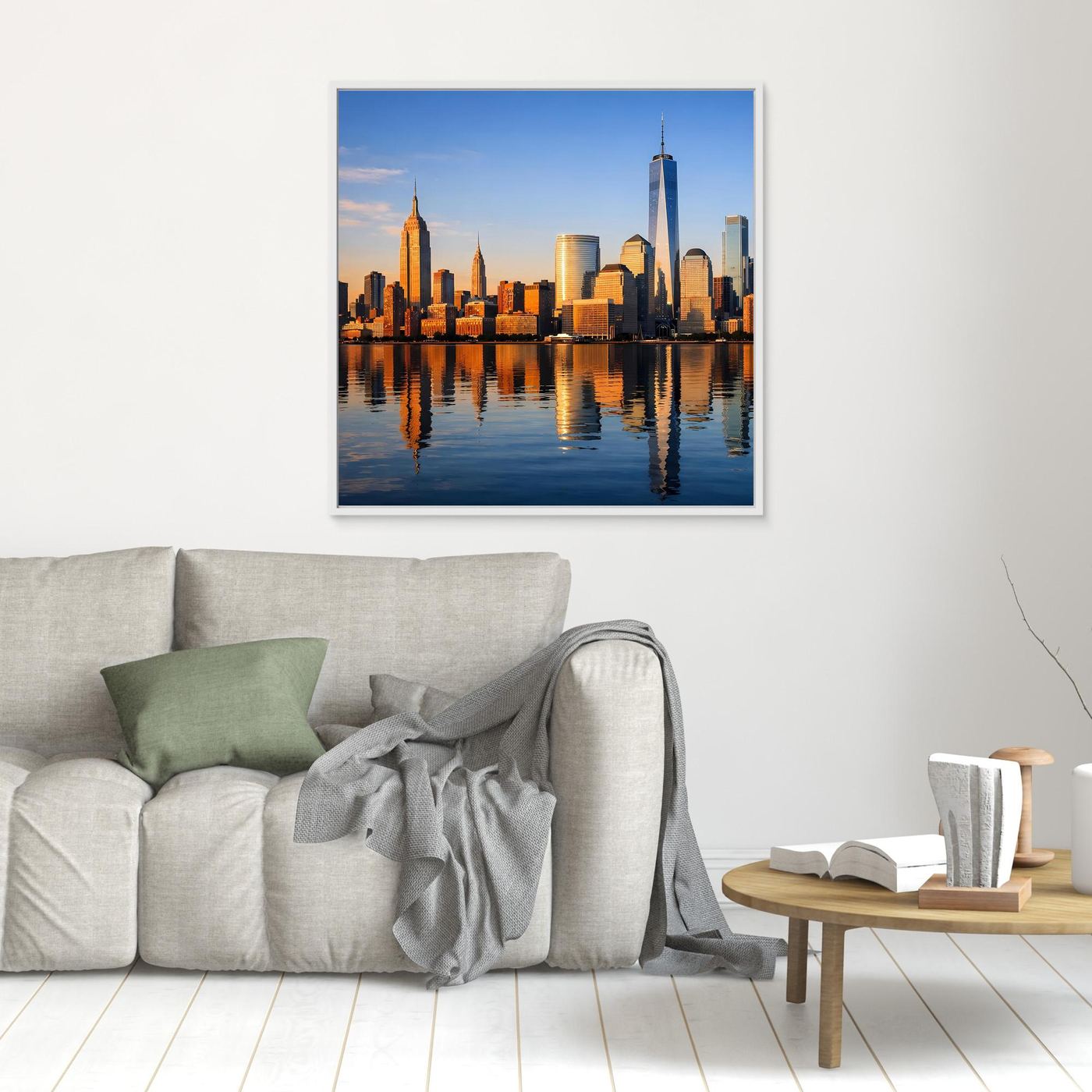 Gerahmtes Leinwandbild mit New-York-Skyline bei Sonnenuntergang und Spiegelung im Wasser