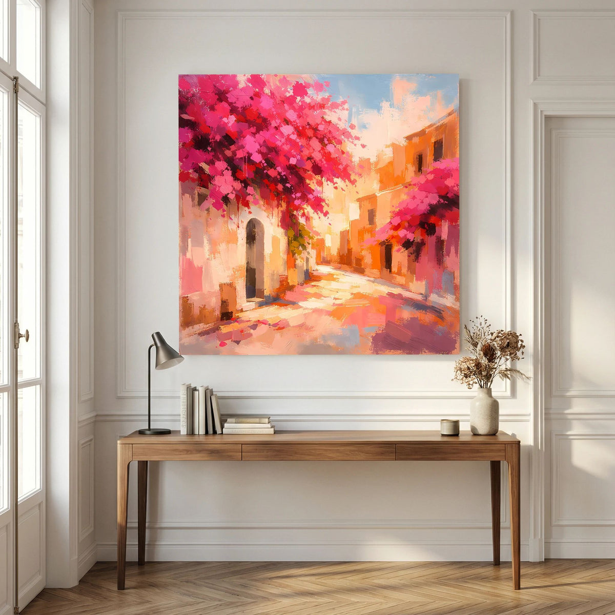 Leinwandbild mit rosa Blütenkrone über der Gasse und orangefarbenem, wolkigem Himmel