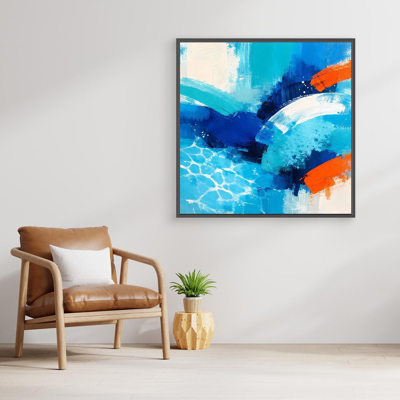 Black-framed abstract canvas wall art of blue sea waves with orange accents
