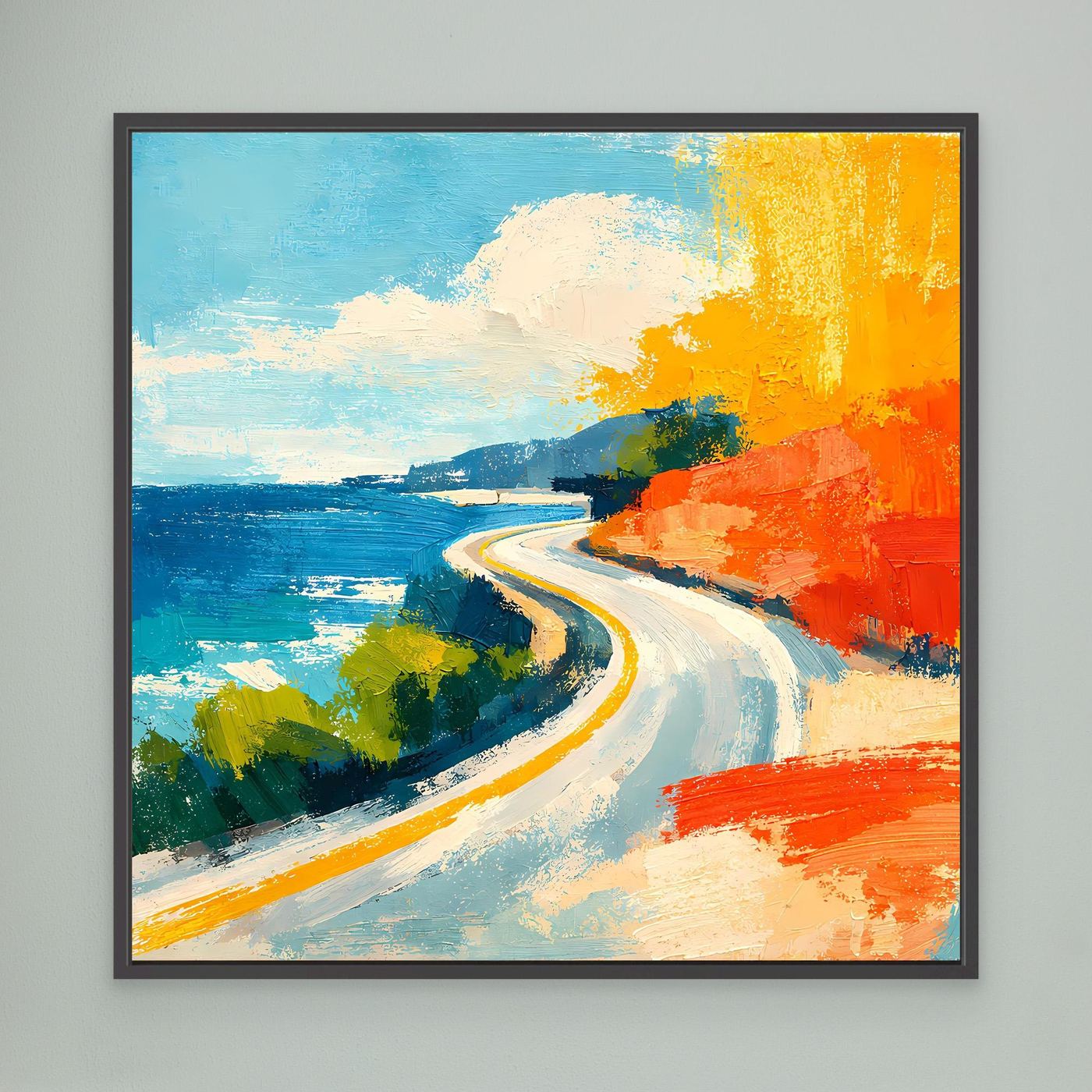 Coastal abstract wall art with black frame, blue water and winding road with orange accents