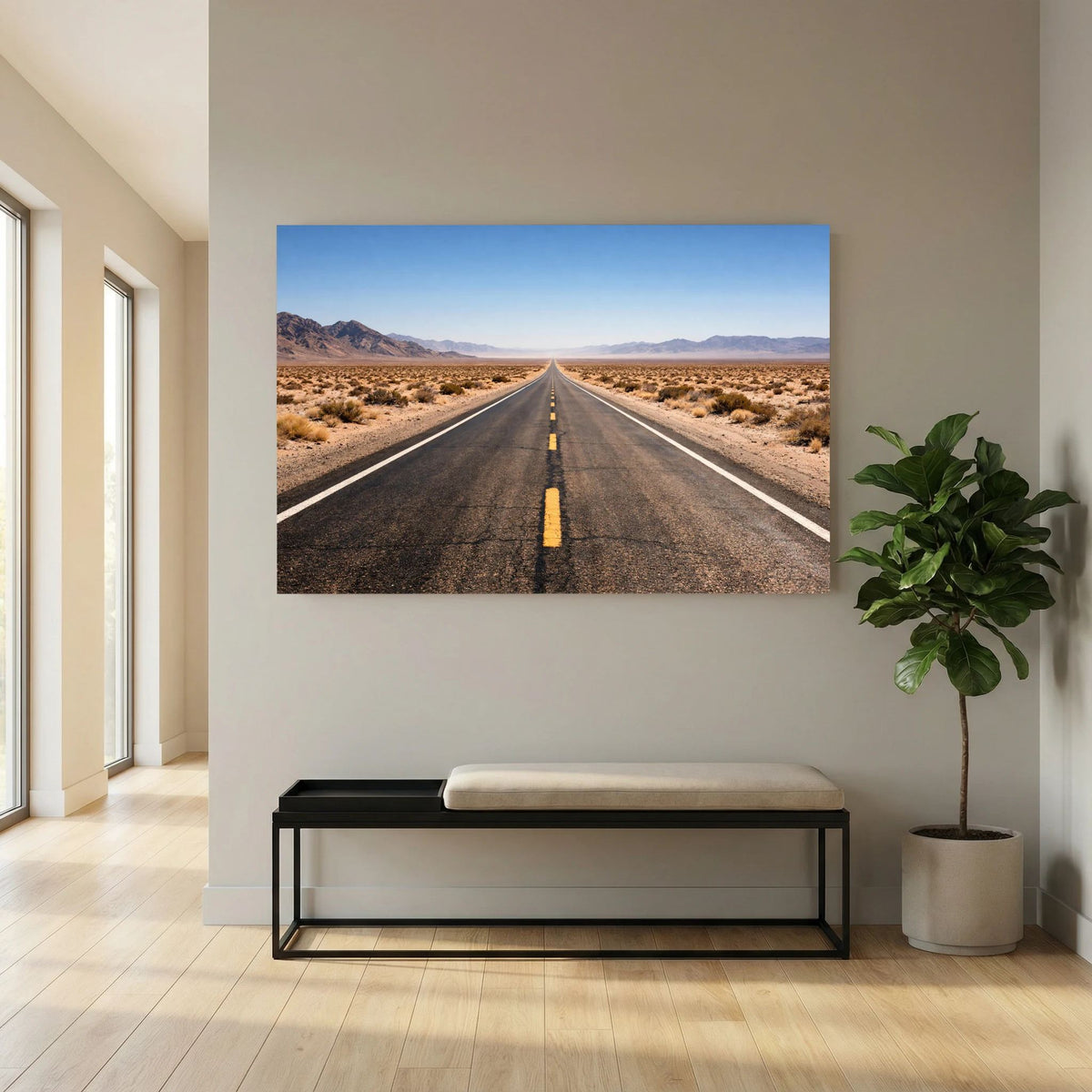 Wandbild quer im Raum: Asphaltstraße durch die Wüste mit Bergen und tiefem Horizont.