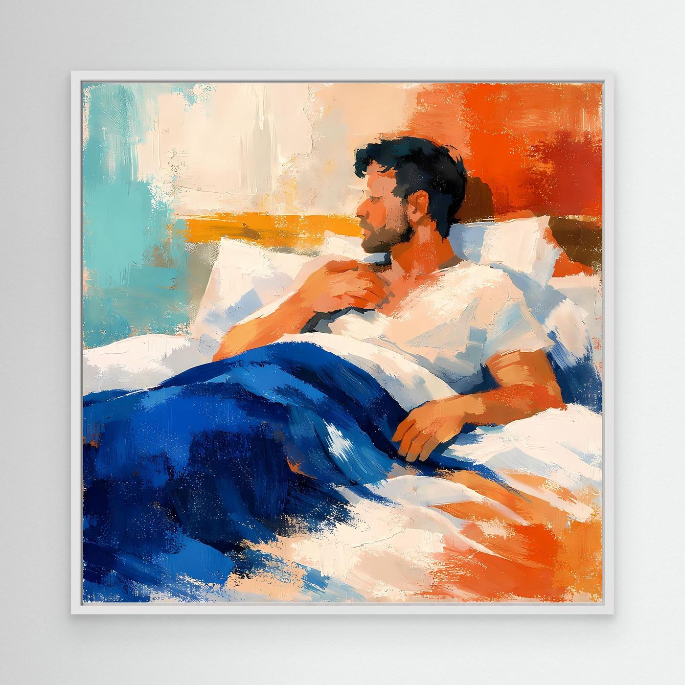Leinwand-Wandbild mit liegendem Mann, abstrakte Farbflächen in Blau und Orange im weißen Rahmen