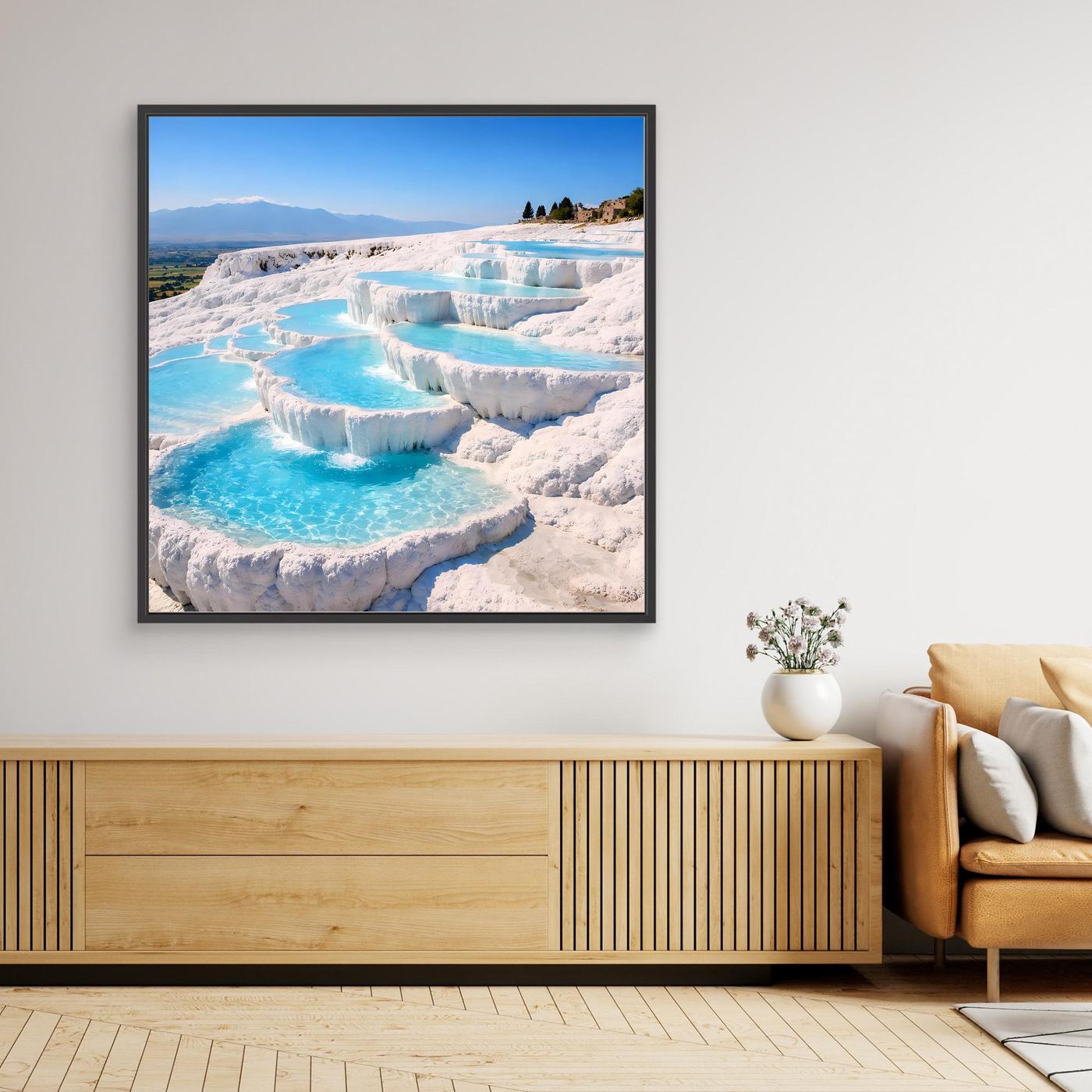 Leinwandbild mit türkisweißen Thermalquellen und Kalkterrassen in schwarzem Rahmen