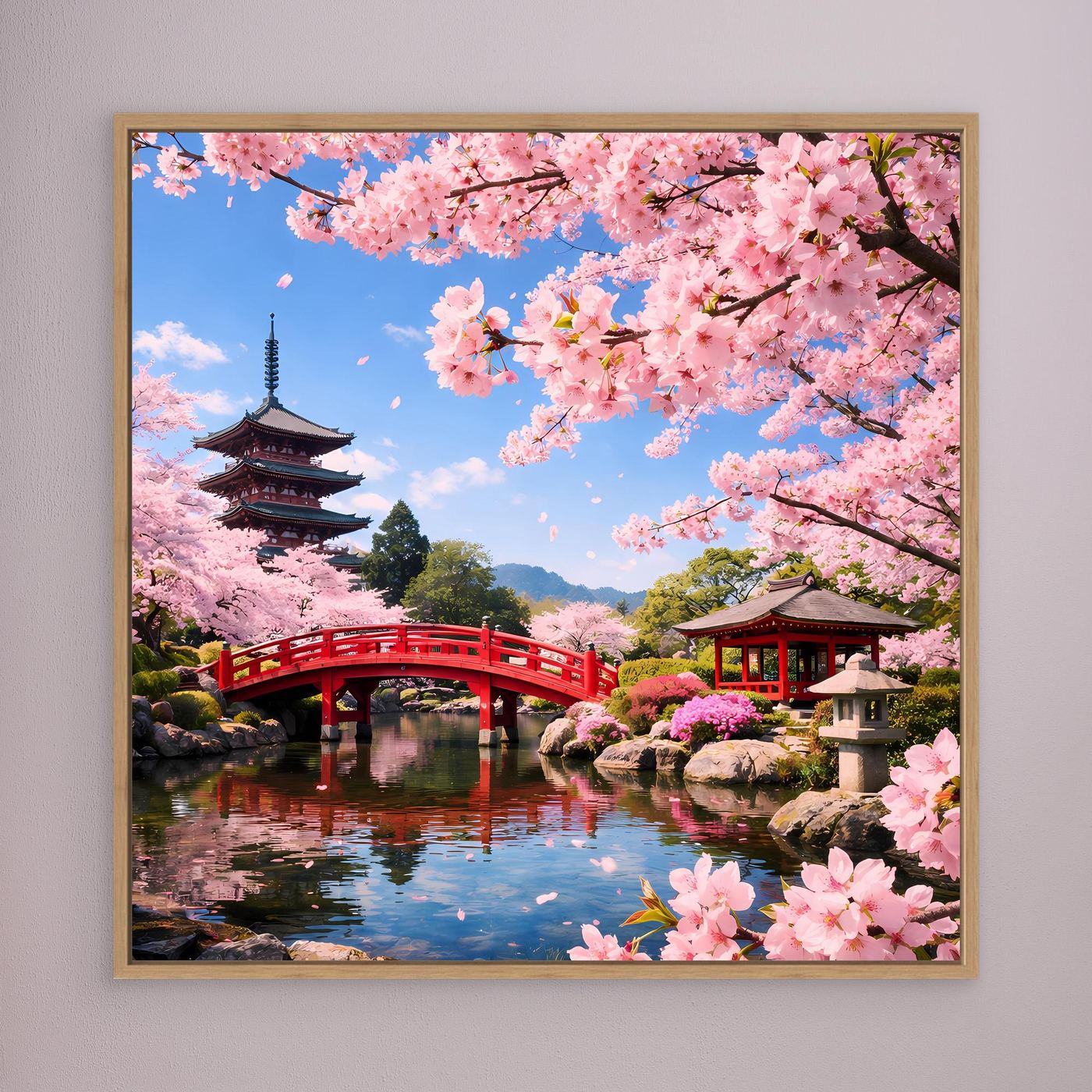 Leinwandbild: Kirschblüten über roter Brücke mit Pagode, goldbrauner Rahmen