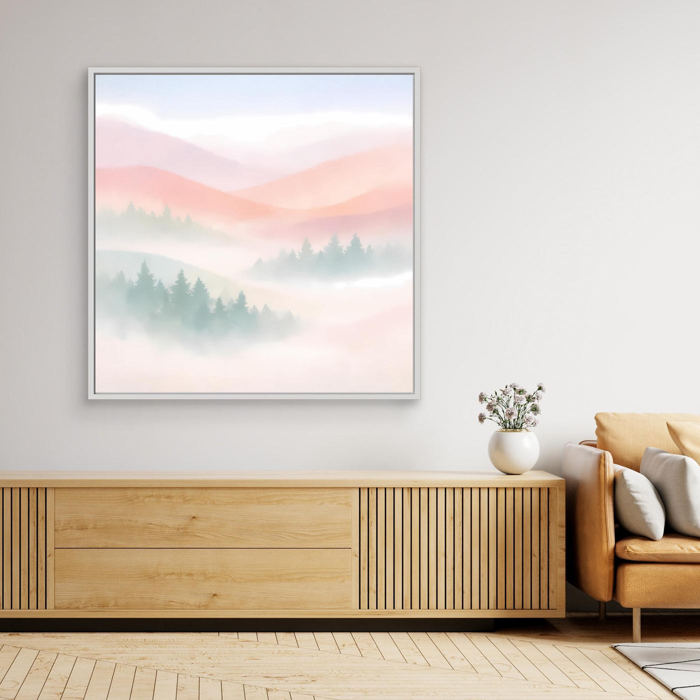 Leinwandbild mit nebliger Berglandschaft in Pastellfarben, weißer Rahmen