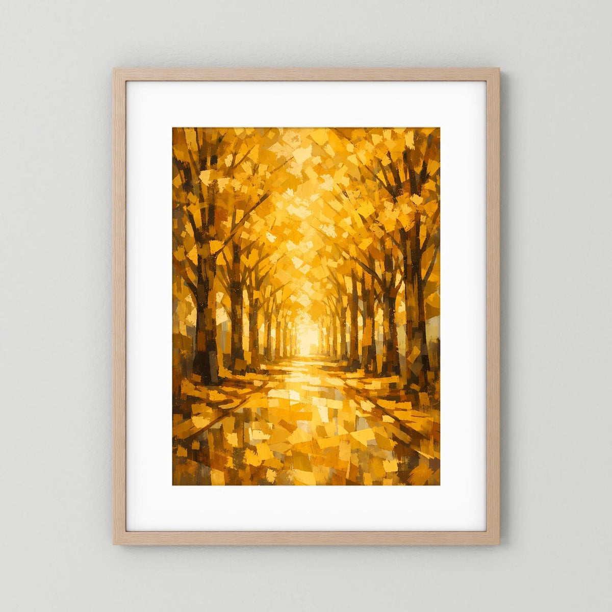 Herbstwald-Wandbild mit Baumallee in Gelb und Gold, heller Holzrahmen mit weißem Rand