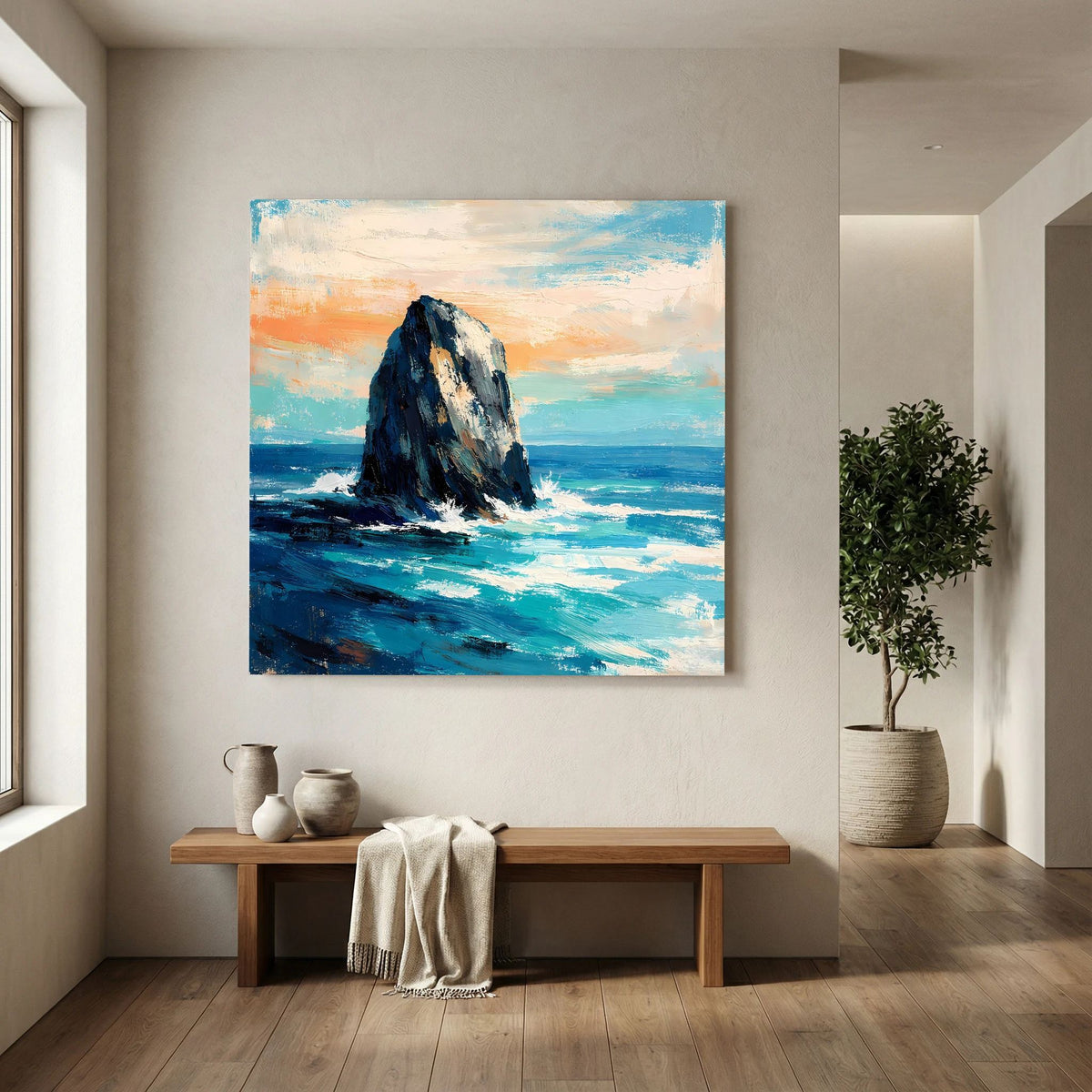 Quadratisches Leinwandbild mit Felsen in der Brandung, kräftig blaue See und orangefarbene Wolken.
