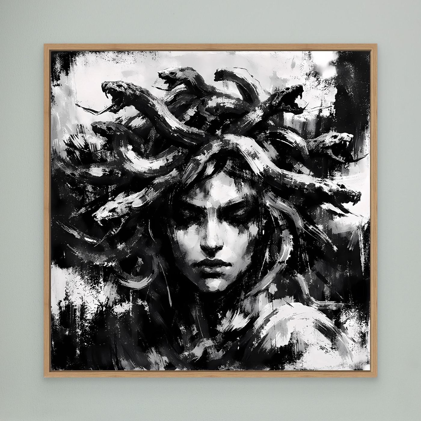 Oak-framed abstract Medusa portrait canvas in black and white, full hair swirl composition.