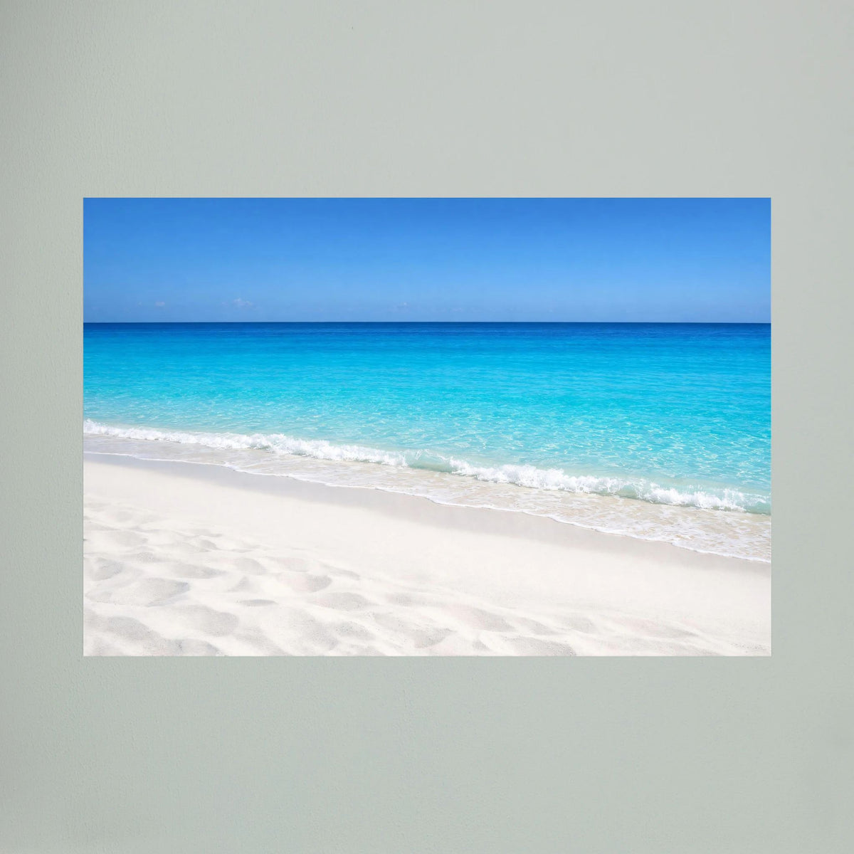Wandbild mit türkisblauem Meer, hellem Sandstrand und blauem Rand, Querformat