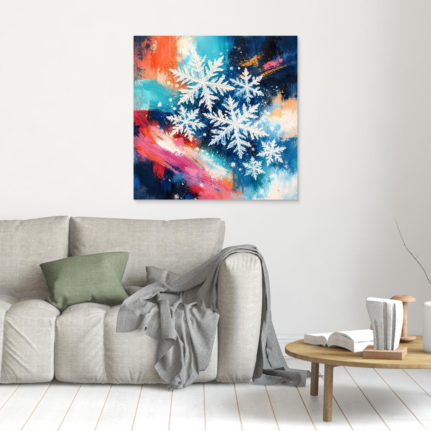 Quadratisches Leinwandbild mit weißen Schneeflocken auf blau-orangefarbenem abstraktem Motiv