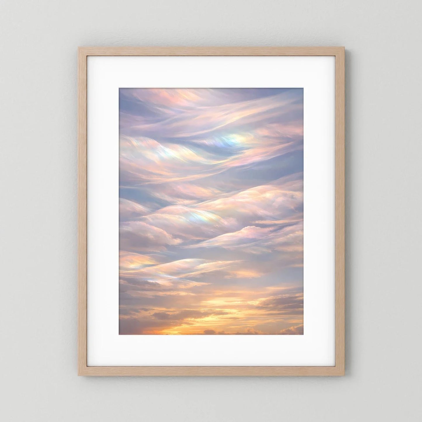 Hochformatiges Wandposter mit hellem Holzrahmen und weißem Passepartout: Pastellwolken bei Sonnenuntergang.