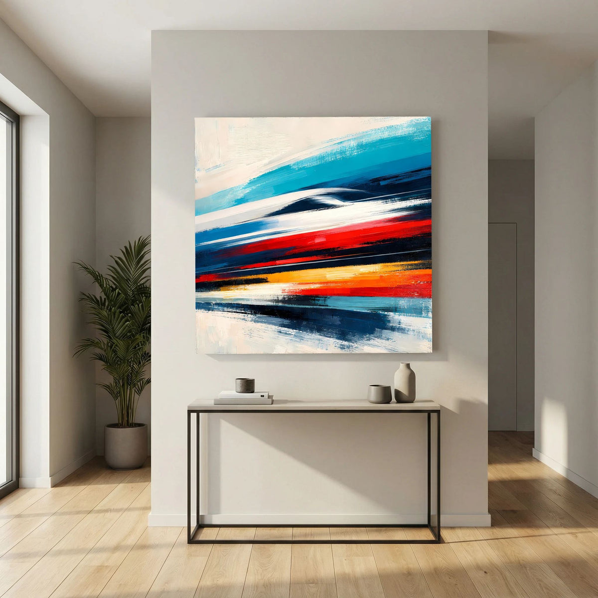 Abstraktes Leinwandbild mit blauen, roten und schwarzen Pinselstrichen auf heller Leinwand
