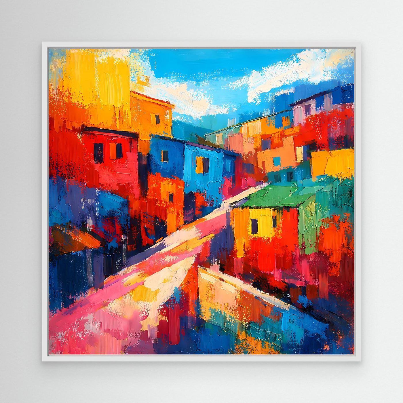 Abstraktes Favela-Wandbild auf Leinwand mit weißem Rahmen: bunte Häuser entlang der Straße