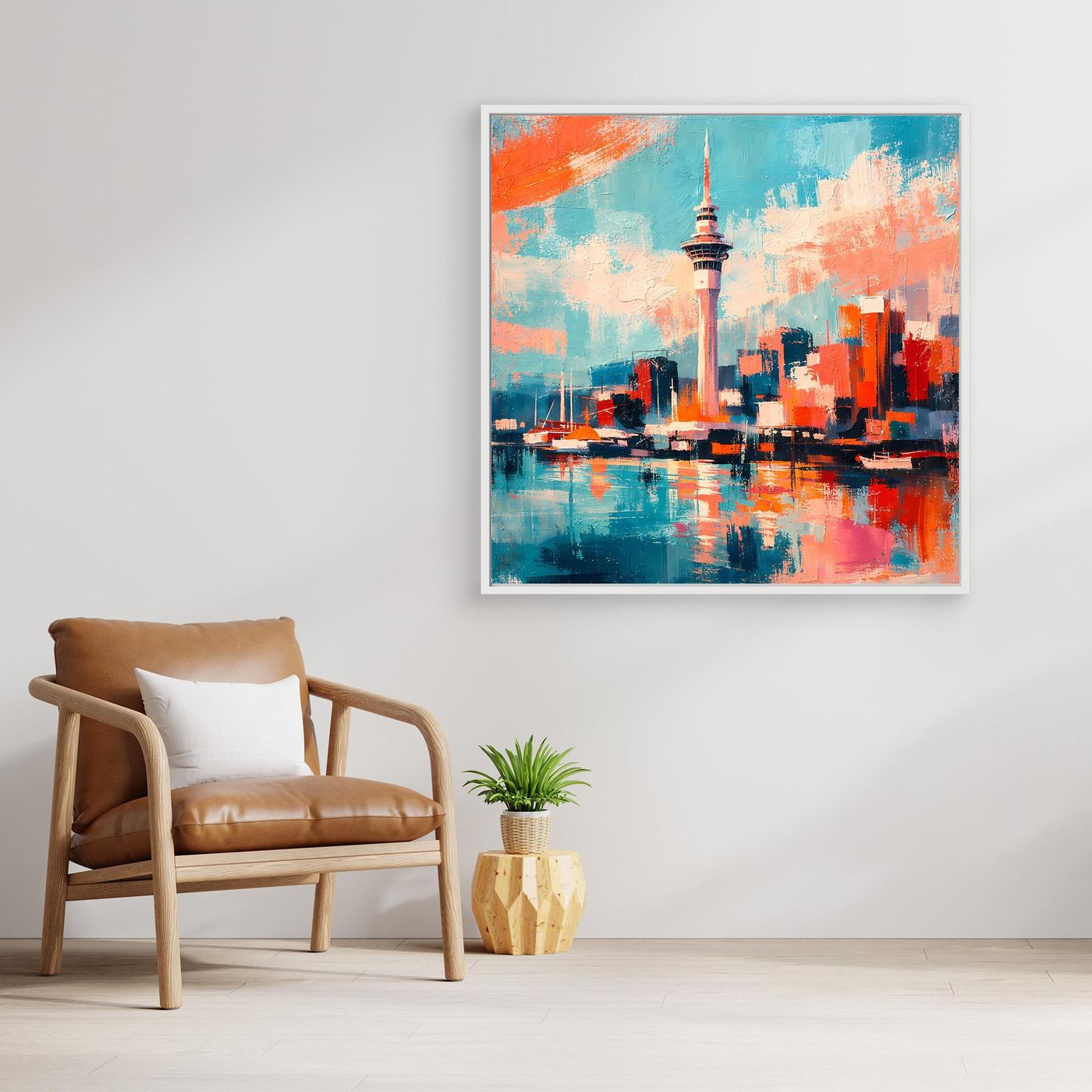 Wandbild mit abstrakter Skyline und Sky Tower, türkis-orange, im hellen Rahmen