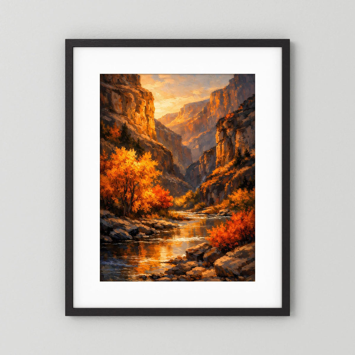 Wandbild mit schwarzem Rahmen und weißem Rand, Canyon mit Herbstbäumen am Fluss.
